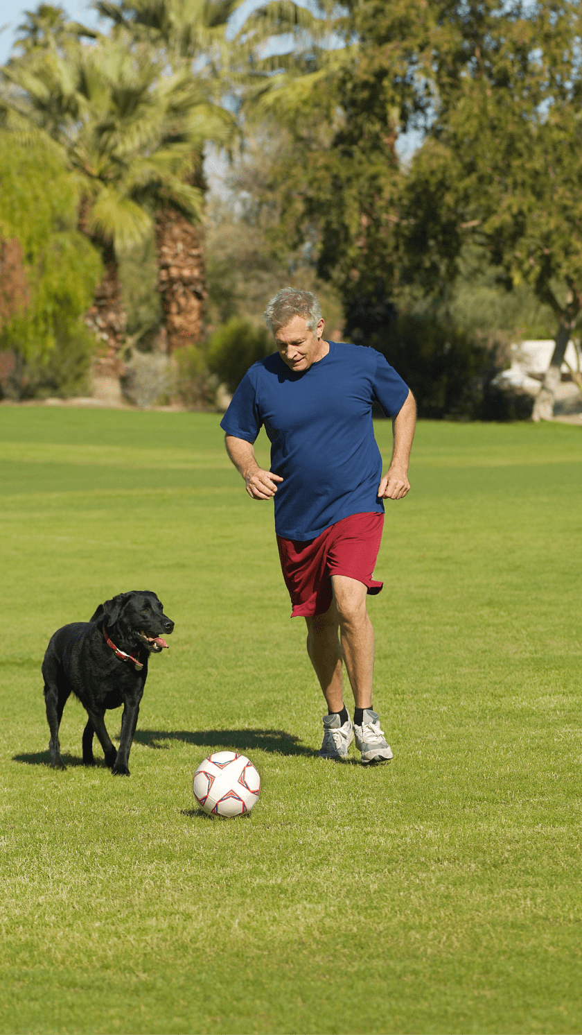 Man playing soccer-min